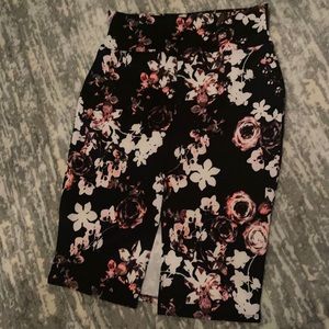 New, polyester floral/black pencil skirt. Size L thick material, sexy skirt 😊